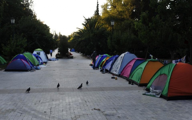 Мигранты и беженцы разбили лагерь в Афинском парке Педио