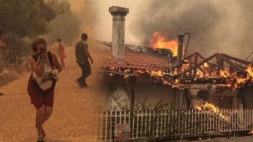 Жители бегут от лесных пожаров, бушующих к западу от Афин