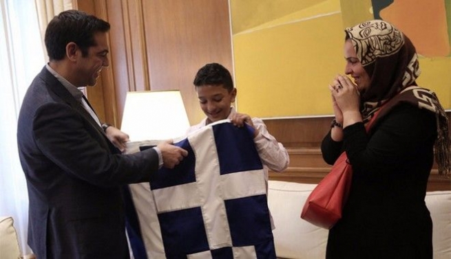 Ципрас вручил греческий флаг Амиру