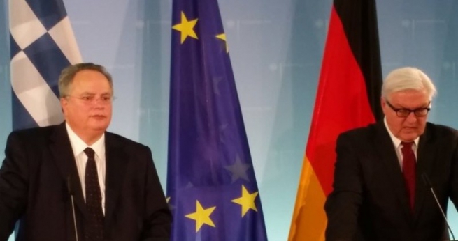 Германия настаивает на "выполнении обязательств"
