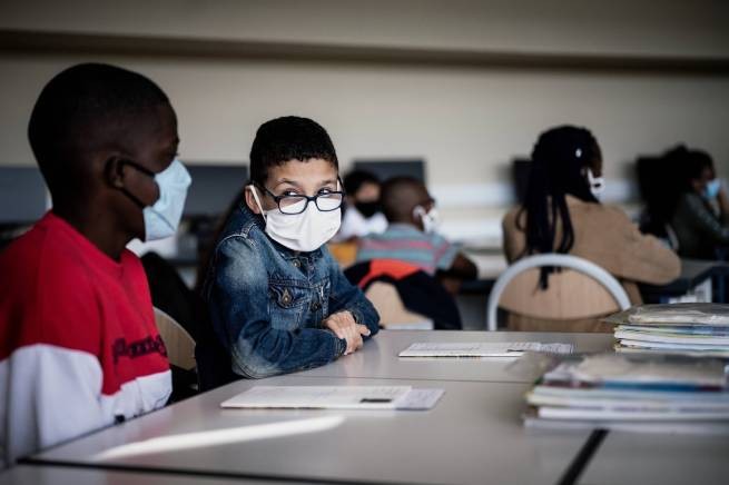 США: открываются школы, растет число инфицированных детей
