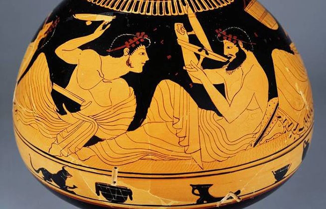 Коттаб - древнегреческая игра. Метание вина из винной чаши.