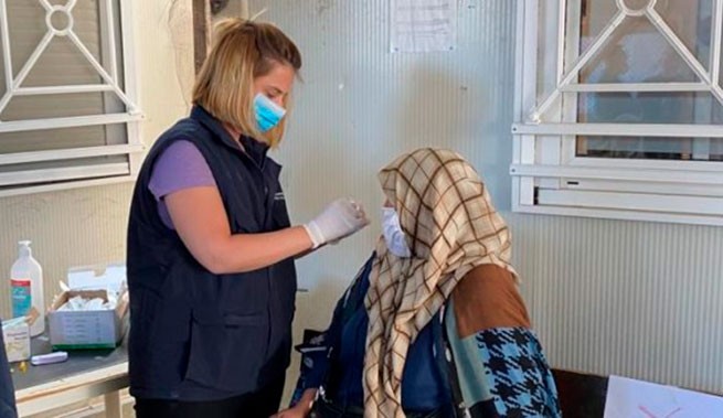 Греция: начата вакцинация в лагерях для мигрантов